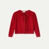 crdigan_de_nia_con_lazada_1-2.webp Cárdigan de niña con lazada rojo-MINI Discount