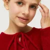 crdigan_de_nia_con_lazada_2-2.webp Cárdigan de niña con lazada rojo-MINI Discount