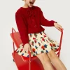 crdigan_de_nia_con_lazada_3-2.webp Cárdigan de niña con lazada rojo-MINI Discount