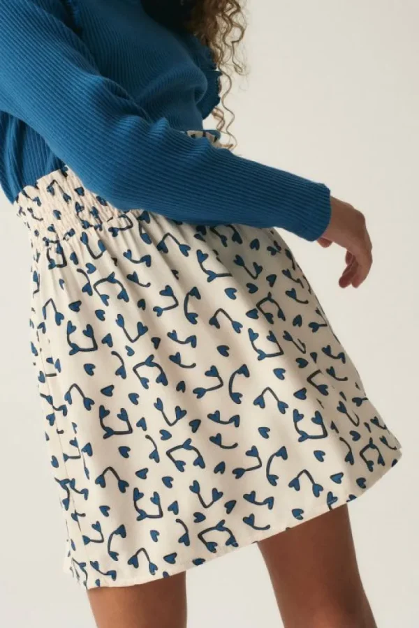 Falda corta de niña con estampado de corazones-MINI Shop