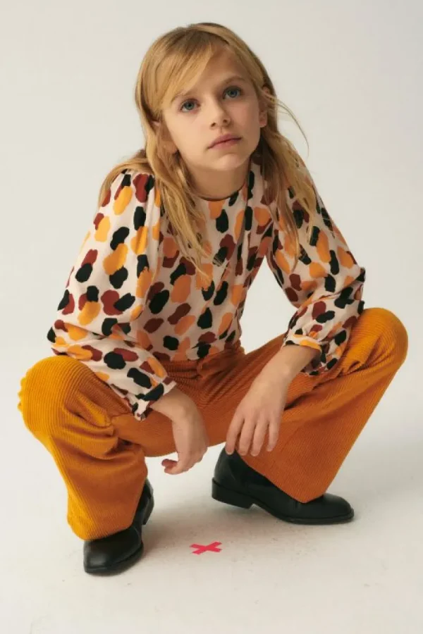 pantaln_de_nia_de_pana_am_0.webp Pantalón de niña de pana amarillo-MINI Sale