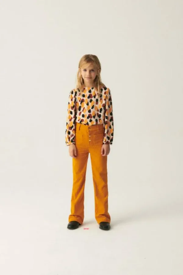 pantaln_de_nia_de_pana_am_3.webp Pantalón de niña de pana amarillo-MINI Sale