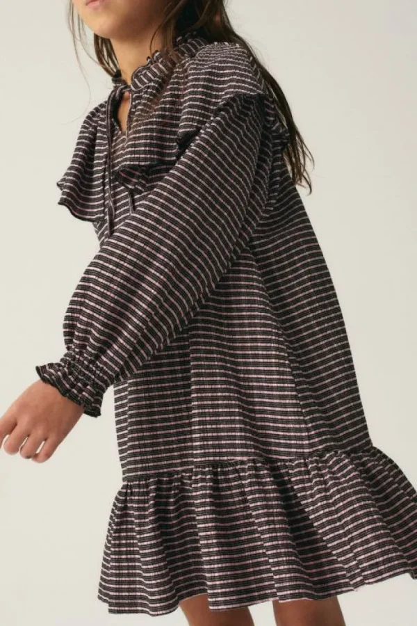 vestido_corto_de_nia_elst_2.webp Vestido corto de niña elástico con estampado de cuadros-MINI Clearance