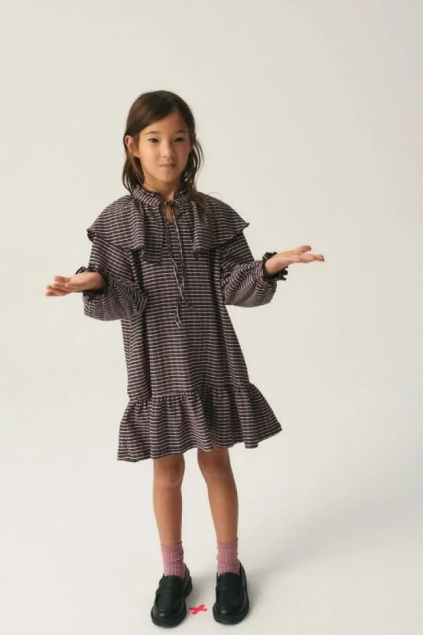 vestido_corto_de_nia_elst_3.webp Vestido corto de niña elástico con estampado de cuadros-MINI Clearance